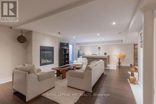 11 Abbey Avenue, St. Catharines (Port Dalhousie), ON - Indoor Photo Showing Living Room With Fireplace