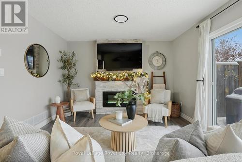 77 Severn Drive, Guelph (Grange Road), ON - Indoor Photo Showing Living Room With Fireplace