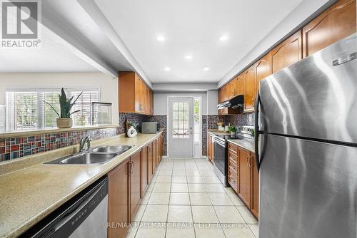 15 Snowgoose Terrace, Toronto, ON - Indoor Photo Showing Kitchen With Double Sink