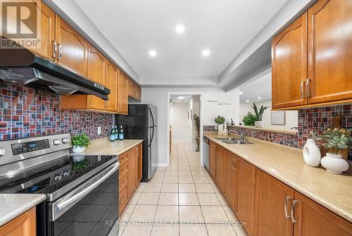 15 Snowgoose Terrace, Toronto, ON - Indoor Photo Showing Kitchen With Double Sink