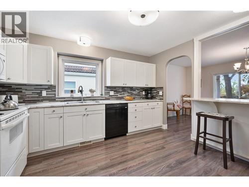 609 Truswell Road Unit# 105, Kelowna, BC - Indoor Photo Showing Kitchen With Double Sink