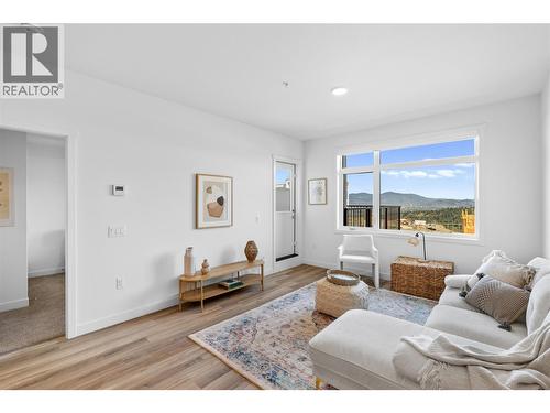 Living- Photos are of a similar home; some features may vary - 1057 Frost Road Unit# 303, Kelowna, BC - Indoor Photo Showing Living Room