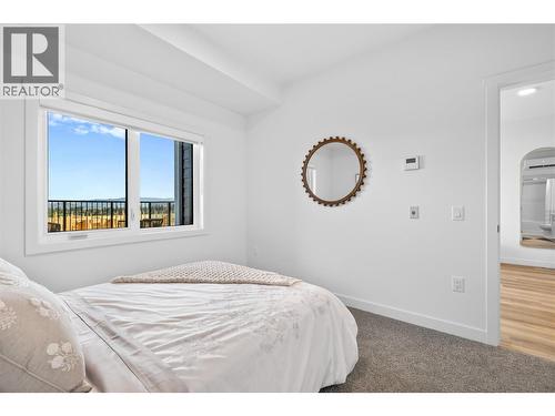 Bedroom - Photos are of a similar home; some features may vary - 1057 Frost Road Unit# 303, Kelowna, BC - Indoor Photo Showing Bedroom