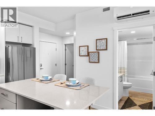 Kitchen- Photos are of a similar home; some features may vary - 1057 Frost Road Unit# 303, Kelowna, BC - Indoor