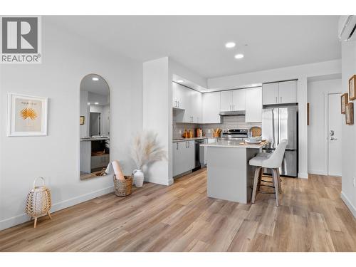 Kitchen & Dining- Photos are of a similar home; some features may vary - 1057 Frost Road Unit# 303, Kelowna, BC - Indoor Photo Showing Kitchen