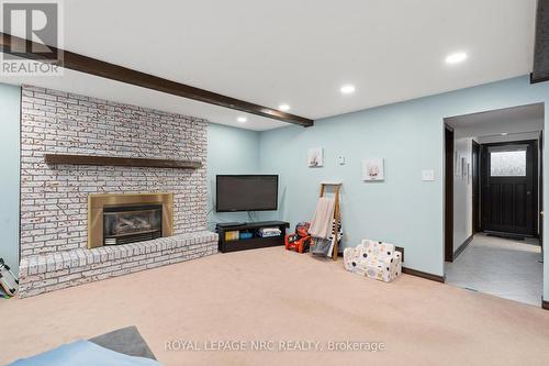 2821 Solar Crescent, Niagara Falls (Stamford), ON - Indoor With Fireplace