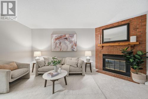 23 Davies Crescent, Whitby (Pringle Creek), ON - Indoor Photo Showing Living Room With Fireplace