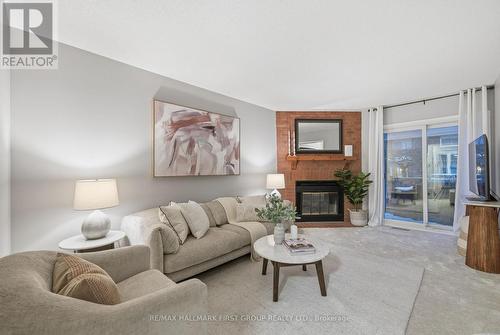 23 Davies Crescent, Whitby (Pringle Creek), ON - Indoor Photo Showing Living Room With Fireplace