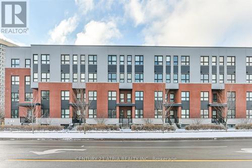 111 - 2100 Bridletowne Circle, Toronto, ON - Outdoor With Facade
