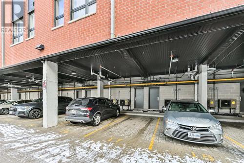 111 - 2100 Bridletowne Circle, Toronto, ON -  Photo Showing Garage