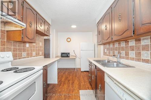 1407 - 3170 Kirwin Avenue, Mississauga, ON - Indoor Photo Showing Kitchen With Double Sink