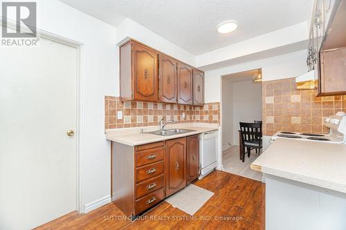 1407 - 3170 Kirwin Avenue, Mississauga, ON - Indoor Photo Showing Kitchen With Double Sink