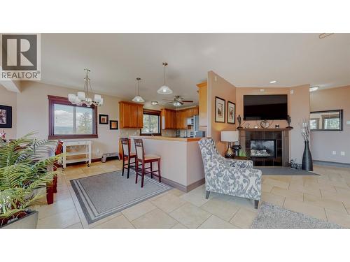 1370 Bullmoose Way, Osoyoos, BC - Indoor With Fireplace