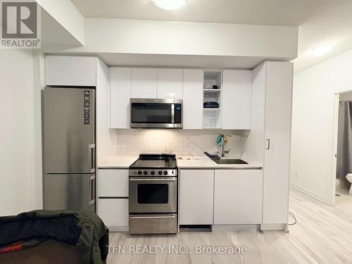 1807 - 251 Manitoba Street, Toronto, ON - Indoor Photo Showing Kitchen With Stainless Steel Kitchen