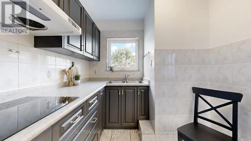 19 Montcalm Avenue, Toronto, ON - Indoor Photo Showing Kitchen With Double Sink