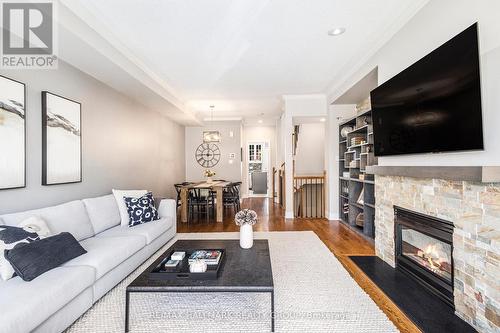 56 Kings Landing Private, Ottawa, ON - Indoor Photo Showing Living Room With Fireplace