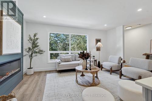27 - 35 Waterman Avenue, London South (South R), ON - Indoor Photo Showing Living Room With Fireplace