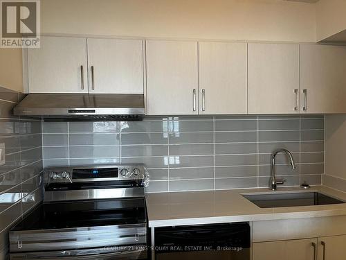 409 - 40 Bay Mills Boulevard, Toronto, ON - Indoor Photo Showing Kitchen