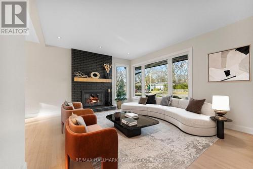 942 Elsett Drive, Ottawa, ON - Indoor Photo Showing Living Room With Fireplace