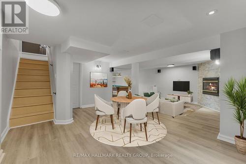 Photo Virtually Staged - 942 Elsett Drive, Ottawa, ON - Indoor Photo Showing Other Room With Fireplace