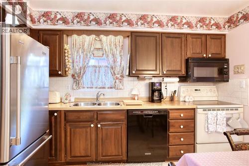 3398 Pineview, Windsor, ON - Indoor Photo Showing Kitchen With Double Sink