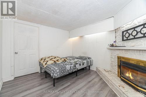 Unit 3 - 1306 Guelph Line, Burlington, ON - Indoor Photo Showing Bedroom With Fireplace