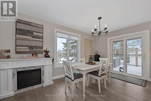 7028 Shadow Ridge Drive, Ottawa, ON - Indoor Photo Showing Dining Room With Fireplace