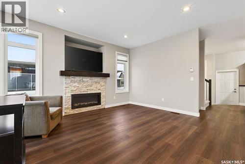 6112 Koep Avenue, Regina, SK - Indoor Photo Showing Living Room With Fireplace