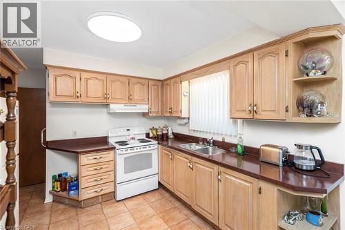 176 Walter Avenue S, Hamilton, ON - Indoor Photo Showing Kitchen With Double Sink
