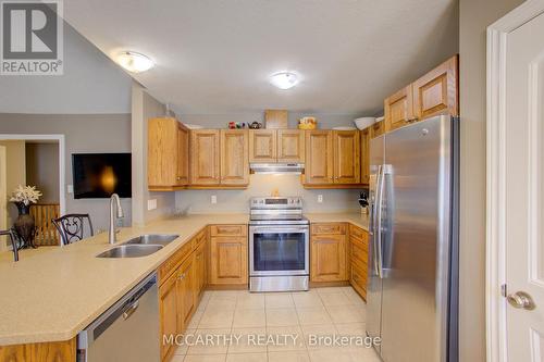 SS appliances in Kitchen - 125 Sheffield Street, Southgate, ON - Indoor Photo Showing Kitchen With Double Sink