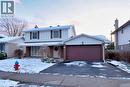 Traditional-style house with a chimney, brick siding, driveway, and an attached garage - 510 Cumberland Avenue, Burlington, ON  - Outdoor 