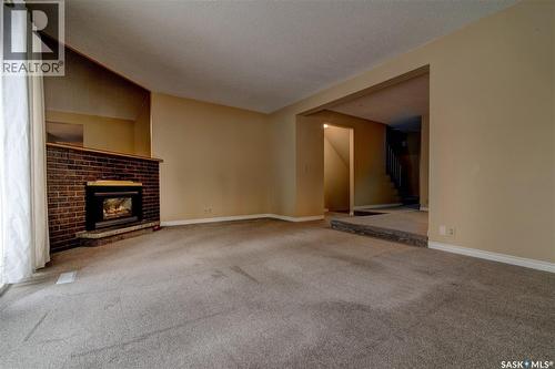 168 Plainsview Drive, Regina, SK - Indoor With Fireplace