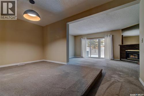 168 Plainsview Drive, Regina, SK - Indoor With Fireplace