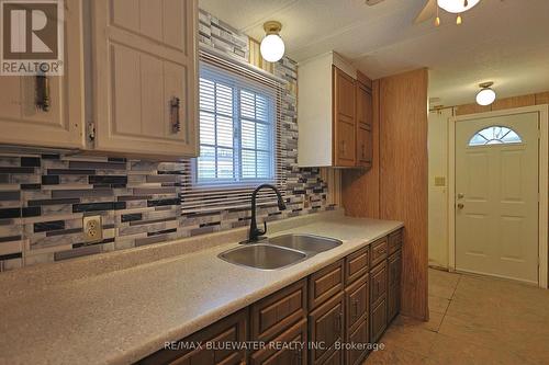 39 St Andrews Place, South Huron (Stephen), ON - Indoor Photo Showing Kitchen With Double Sink