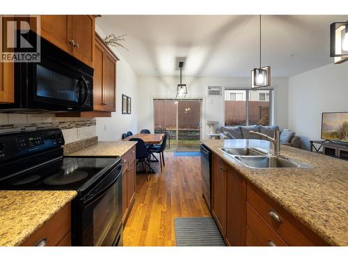 10634 Powley Court Unit# 208, Lake Country, BC - Indoor Photo Showing Kitchen With Double Sink