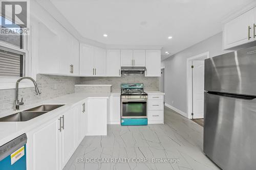 220 Grenfell Street, Hamilton, ON - Indoor Photo Showing Kitchen With Stainless Steel Kitchen With Double Sink With Upgraded Kitchen