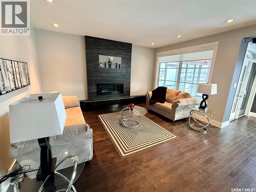 3633 Green Water Drive, Regina, SK - Indoor Photo Showing Living Room With Fireplace