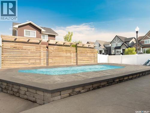 3633 Green Water Drive, Regina, SK - Outdoor With In Ground Pool