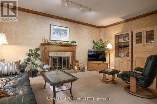 61 Allayden Drive, Whitby (Lynde Creek), ON - Indoor Photo Showing Living Room With Fireplace