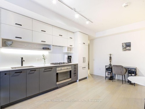 201-1888 Queen Street E, Toronto, ON - Indoor Photo Showing Kitchen With Upgraded Kitchen