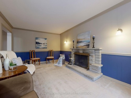 34 Charade Court, Toronto, ON - Indoor Photo Showing Living Room With Fireplace