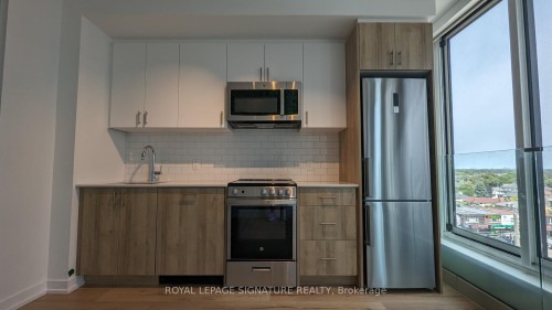 610-1195 The Queensway N/A, Toronto, ON - Indoor Photo Showing Kitchen With Stainless Steel Kitchen