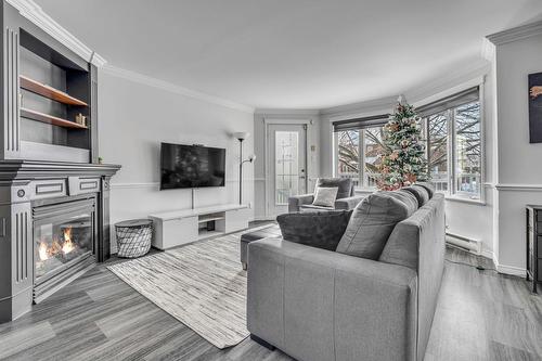 Living room - 1337 Rue Charles-Rodrigue, Lévis (Desjardins), QC - Indoor Photo Showing Living Room With Fireplace