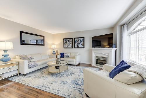 1111-2440 Old Okanagan Highway, West Kelowna, BC - Indoor Photo Showing Living Room With Fireplace