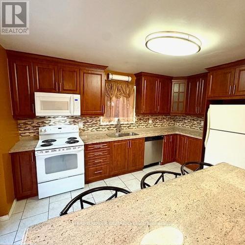 Kit - 63 Acadian Heights, Brampton, ON 