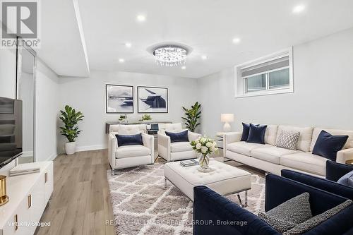 Virtually staged Lower level recreation area - 720 Cappamore Drive, Ottawa, ON - Indoor Photo Showing Living Room