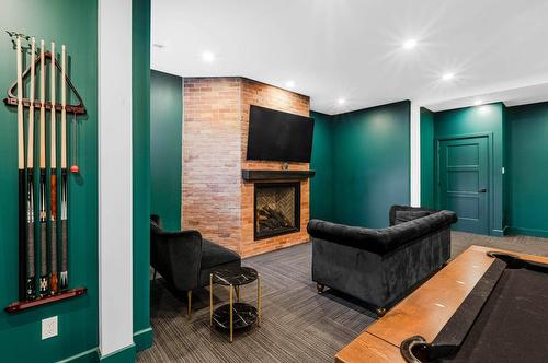 Salle familiale - 1488 Rue Alice-Campbell, Sherbrooke (Les Nations), QC - Indoor With Fireplace