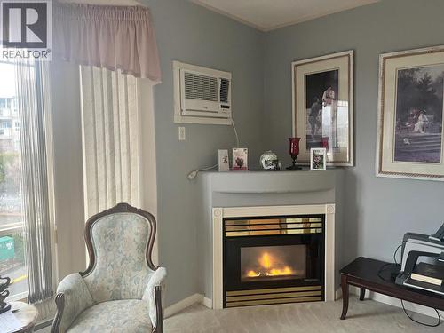 cozy fireplace - natural gas - 3221 Centennial Drive Unit# 401, Vernon, BC - Indoor Photo Showing Living Room With Fireplace