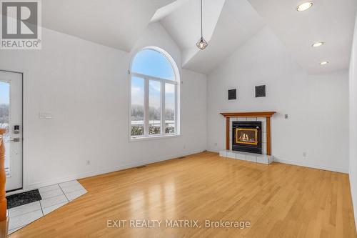 1650 Gourley Road, East Hawkesbury, ON - Indoor Photo Showing Living Room With Fireplace