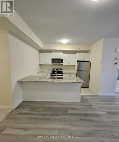 17 - 165 Tapscott Road, Toronto, ON - Indoor Photo Showing Kitchen